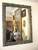 Early 19th century pair carved wood mirrors