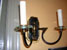 20th century pair black enamel brass and glass sconces
