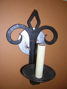 fleur de lis design, newly electrified sconces