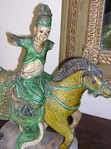 pair of Chinese Tang dynasty roof tiles of warriors on horseback