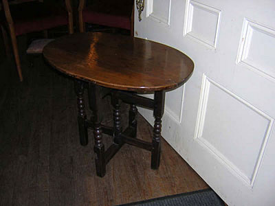 19th century English oak tuck away table